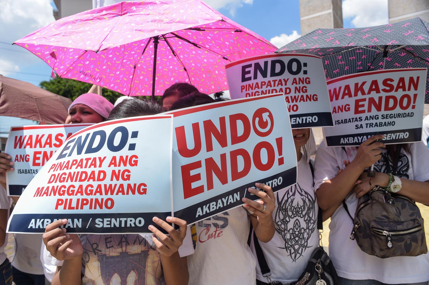 WARM-UP. Protesters hold a pre-Labor Day protest in Quezon City on April 30, 2018 to call for an end to ENDO. All photos by LeAnne Jazul/Rappler 