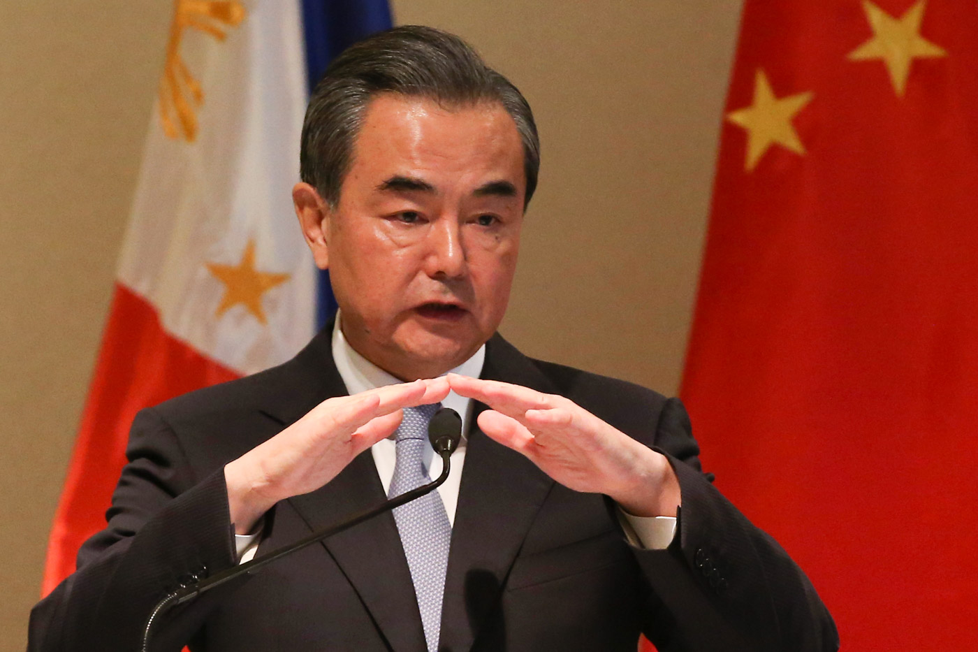 OFFICIAL VISIT. Chinese Foreign Minister Wang Yi speaks at a joint press conference with Philippine Foreign Secretary Alan Peter Cayetano at the Shangri-La Hotel in Taguig City on July 25, 2017. Photo by Ben Nabong/Rappler 