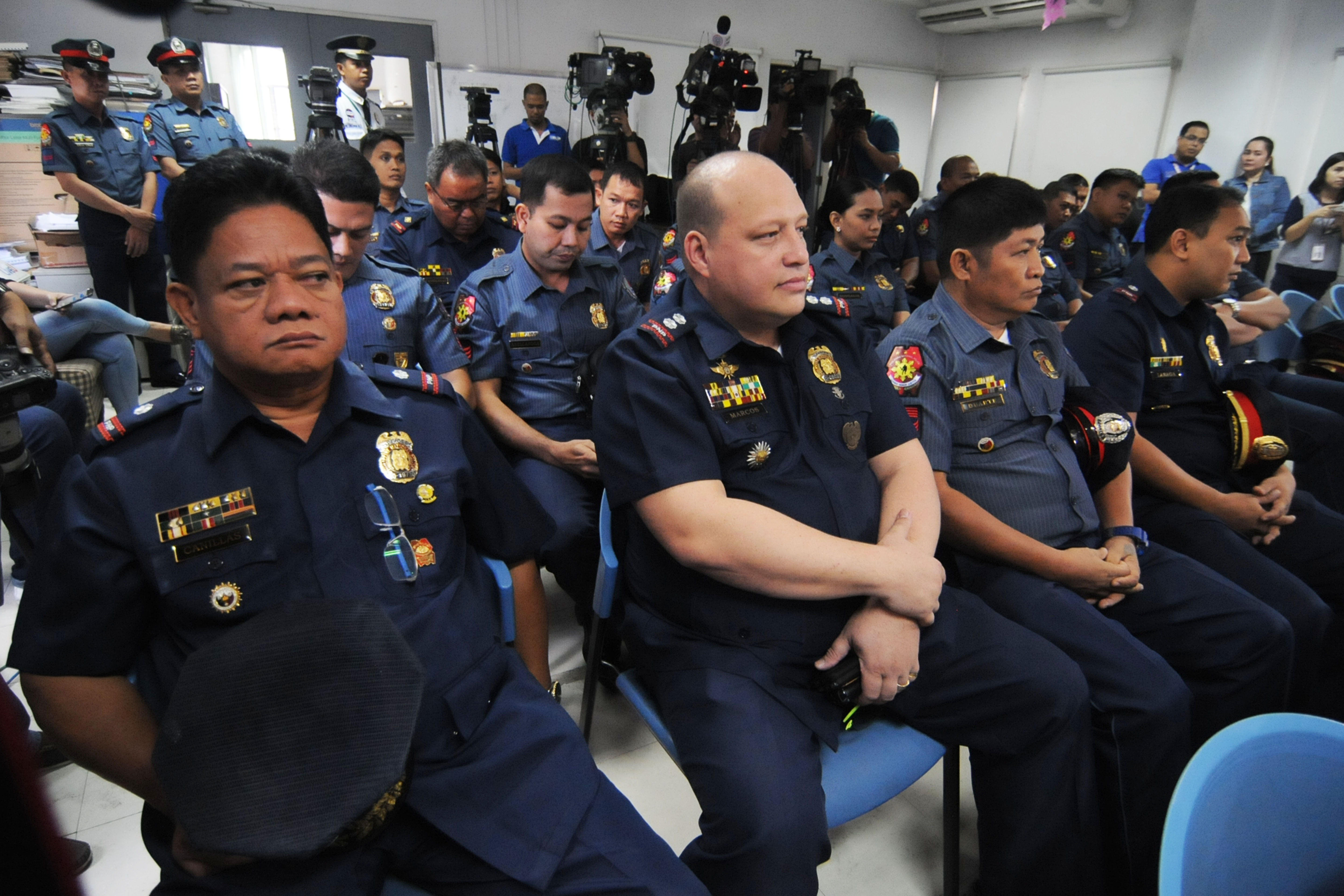 EMBATTLED COPS. Superintendent Marvin Marcos (2nd from left) with others tagged in the killing of Albuera Mayor Rolando Espinosa Sr at the preliminary investigation into the criminal complaint against them at the Department of Justice on December 20, 2016. File photo by Ben Nabong/Rappler 