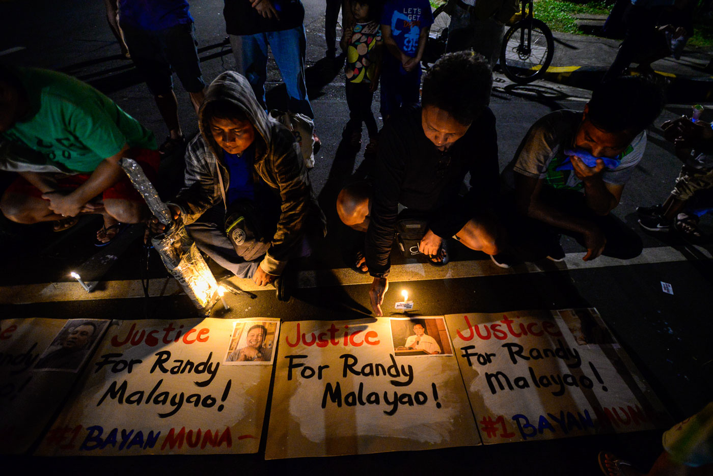 EXTRAJUDICIAL KILLINGS. 4 out of 5 Filipinos are afraid of becoming victims of EJK, according to SWS. In the photo, members of human rights organizations hold a rally at the UP Diliman over the killing of NDF peace consultant Randy Malayao. Photo by Maria Tan/Rappler  