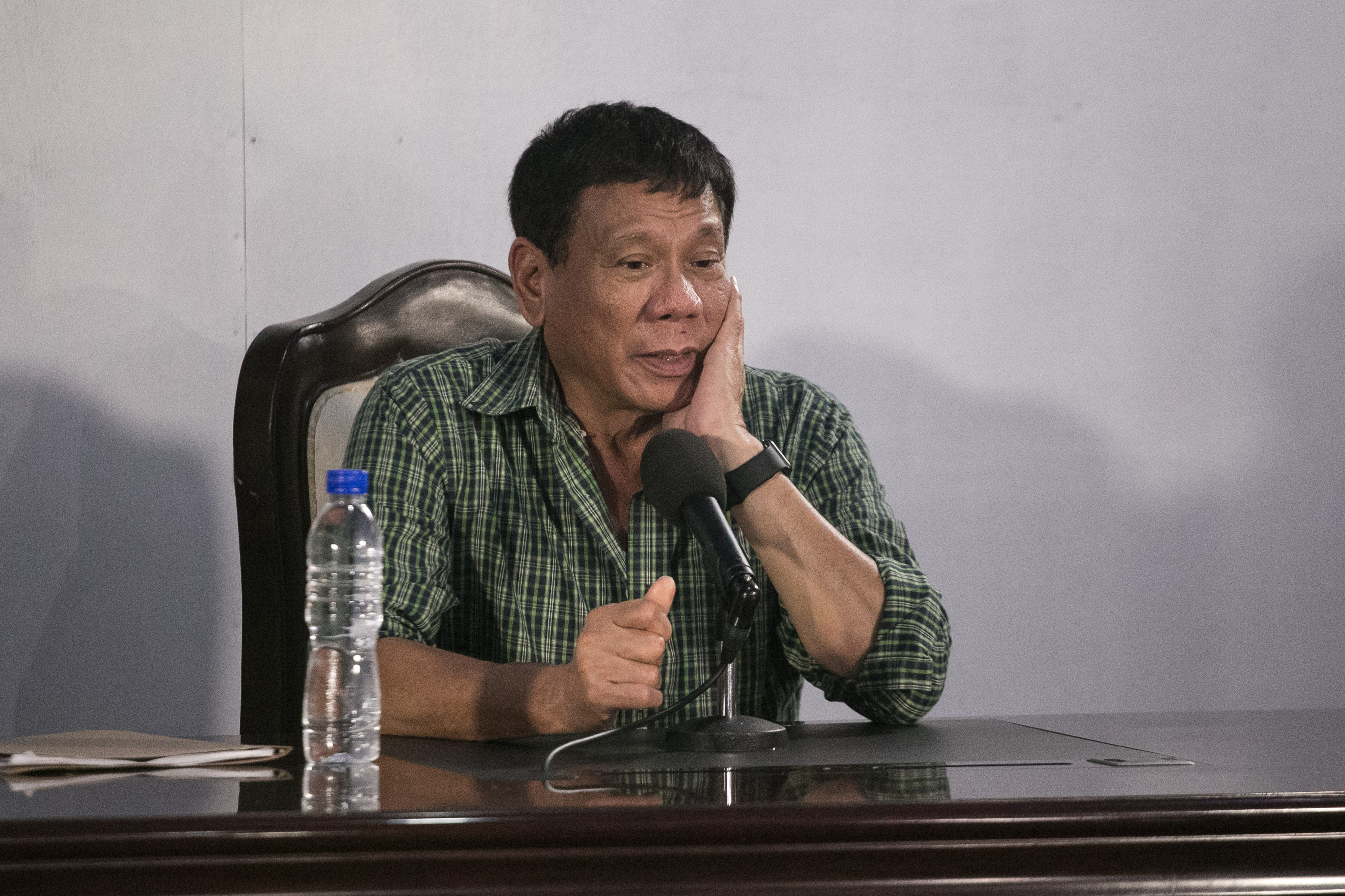 UNDER FIRE. President-elect Rodrigo Duterte draws flak for catcalling GMA-7 reporter Mariz Umali during a press conference. Photo by Manman Dejeto/Rappler   