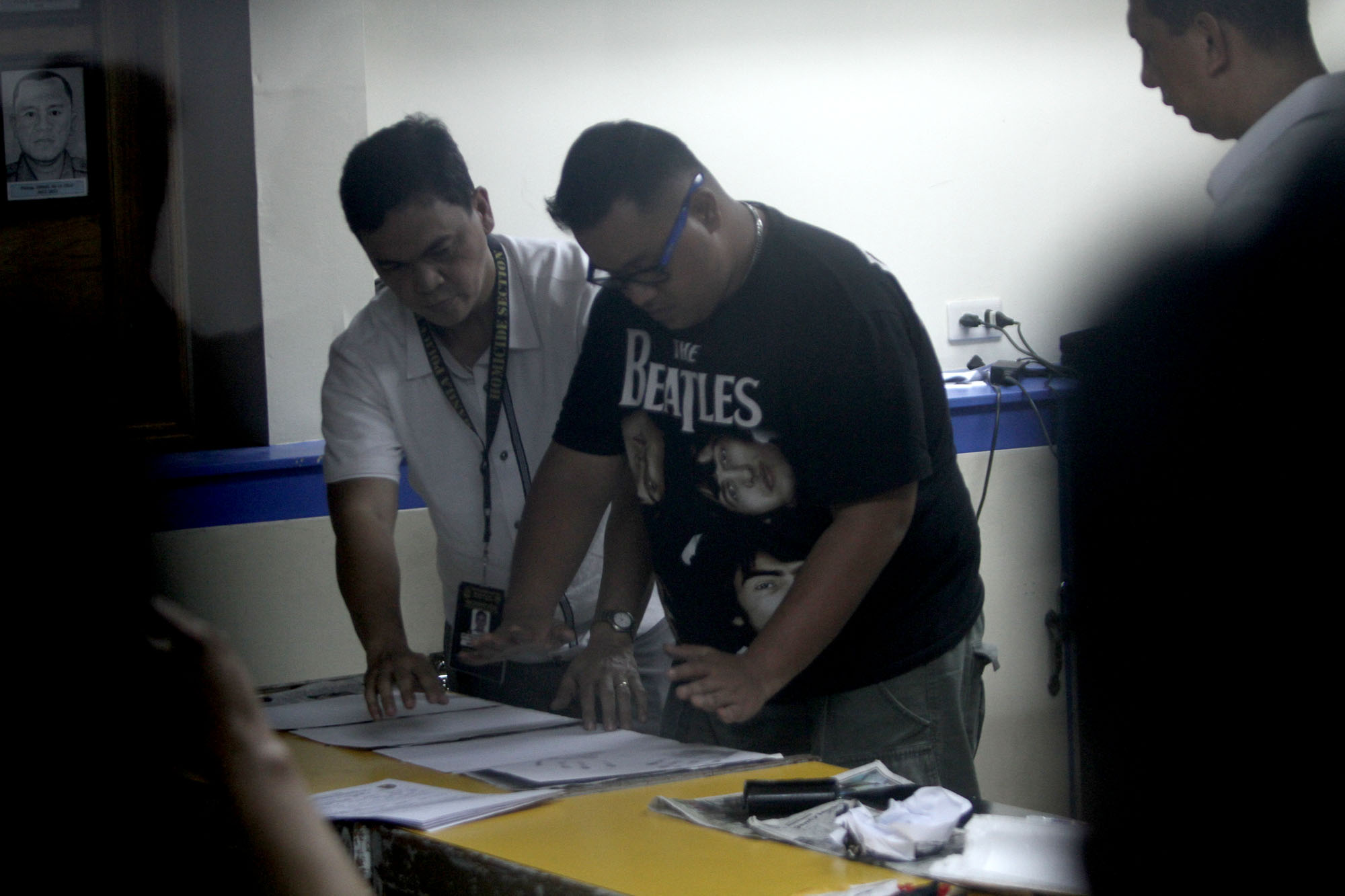 SUSPECT. John Paul Solano, the principal suspect in the killing of Horacio Castillo III, undergoes booking procedures at the Manila Police District headquarters on September 22, 2017. Photo by Inoue Jaena/Rappler 