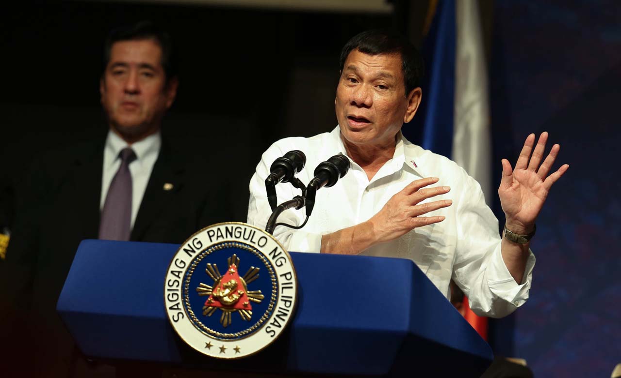 President Rodrigo Duterte gestures in his speech as he addresses the Filipino community in Japan in a meeting at the Palace Hotel in Tokyo on October 25, 2016. Presidential Photo/Karl Norman Alonzo 