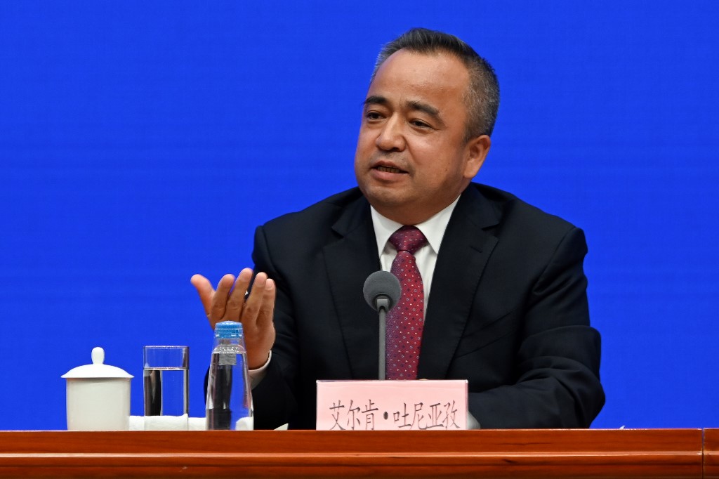 XINJIANG CAMPS. Alken Tuniaz, a member of the Standing Committee of the CPC Committee and vice chairman of the Xinjiang Uyghur Autonomous Region, takes part in a press conference in Beijing on July 30, 2019. Photo by Wang Zhao/AFP  