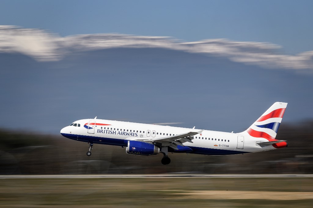 BRITISH AIRWAYS. A British Airways Airbus A320 commercial plane with registration G-TTOB is landing at Geneva Airport on March 22, 2019 in Geneva. Photo by Fabrice Coffrini/AFP 