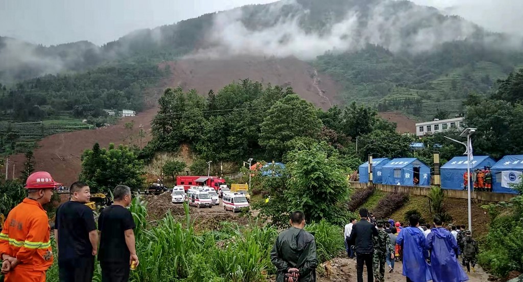 LANDSLIDE. Rescuers gather at the site of a landslide in Liupanshui in China's southwestern Guizhou province on July 24, 2019. File photo by STR/AFP 