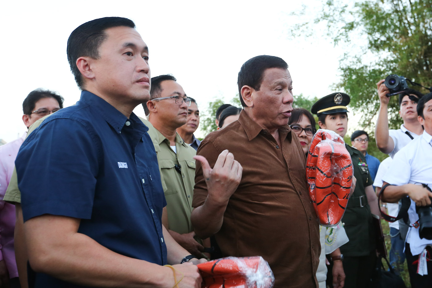 TRUSTED MAN. President Rodrigo Duterte heaps praises on his former aide and now senatorial candidate Bong Go during public speeches. Malacañang photo 