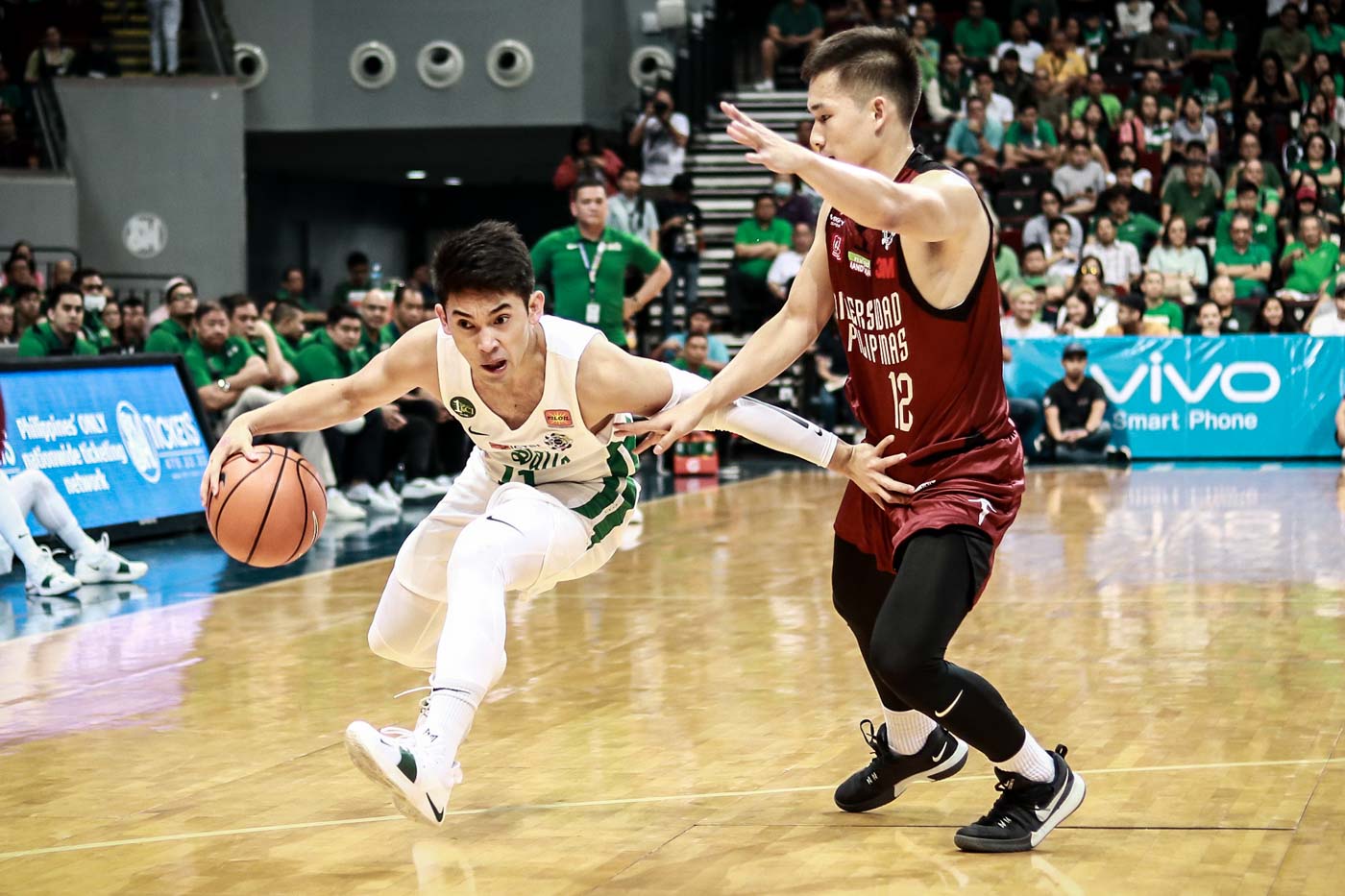 MUST WIN. The Archers and the Maroons dispute the No. 3 spot. Photo by Michael Gatpandan/Rappler  