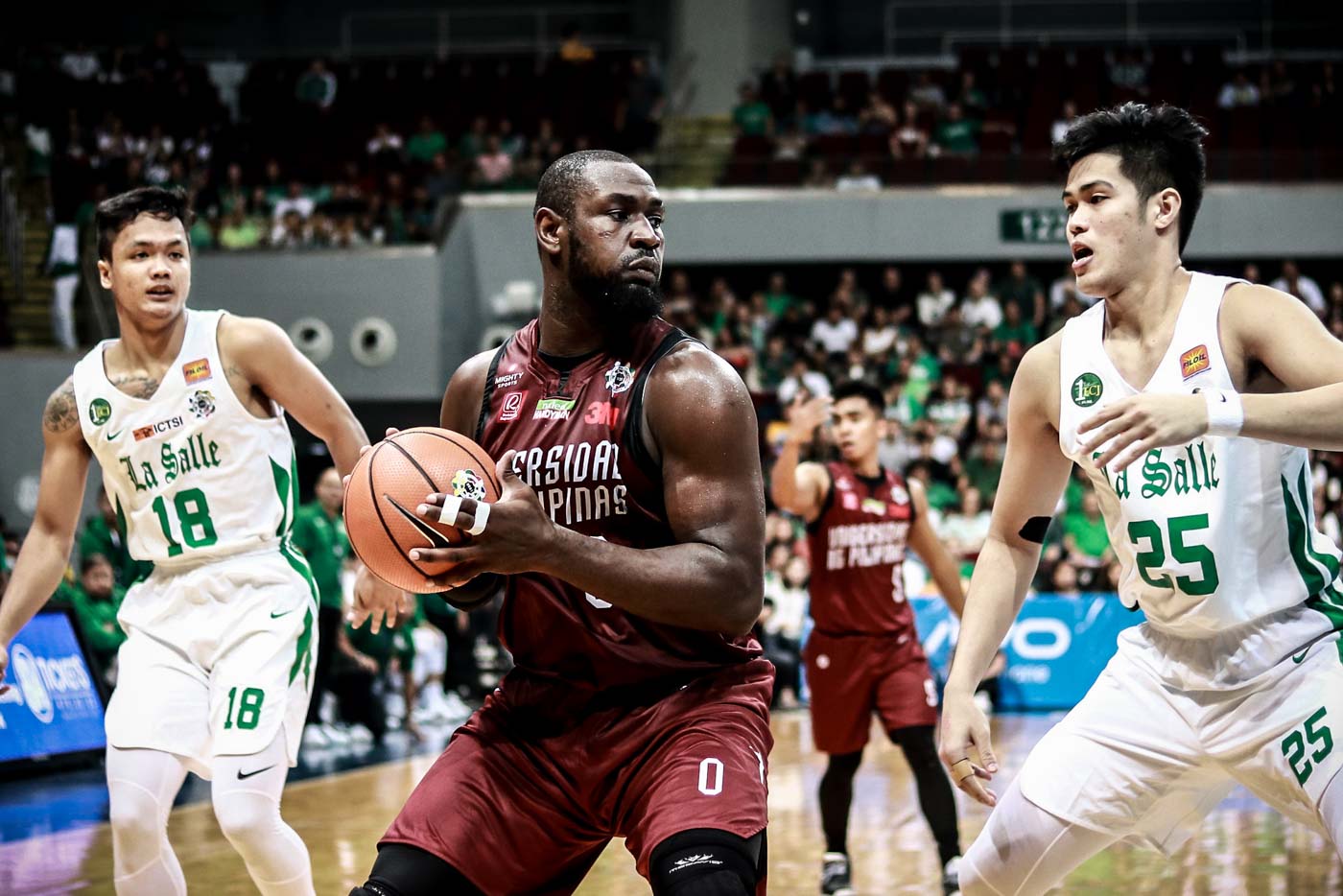 REBOUND. Bright Akhuetie and the UP Fighting Maroons arrest a three-game losing skid to pick up their second win.Photo by Michael Gatpandan/Rappler  