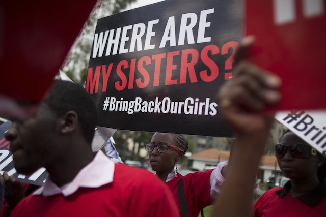 BRING THEM BACK. In this file photo, Kenyan activists hold up placards in front of the Nigerian High Commission, during a demonstration to protest against kidnapping of Nigerian school girls by Nigeria's Islamist militant group Boko Haram, in Nairobi, Kenya, 15 May 2014. Dai Kurokawa/EPA
