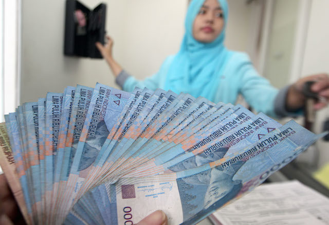RUPIAH UP. The dollar is down against emerging-market currencies. EPA/ADI WEDA