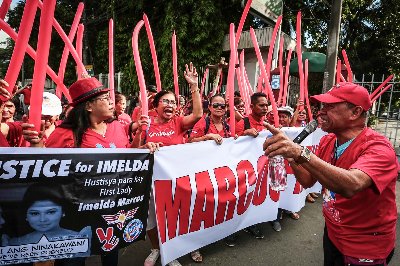 'MARCOS PA RIN'. A handful of Marcos loyalists rally outside the Sandiganbayan on November 16, 2018  
