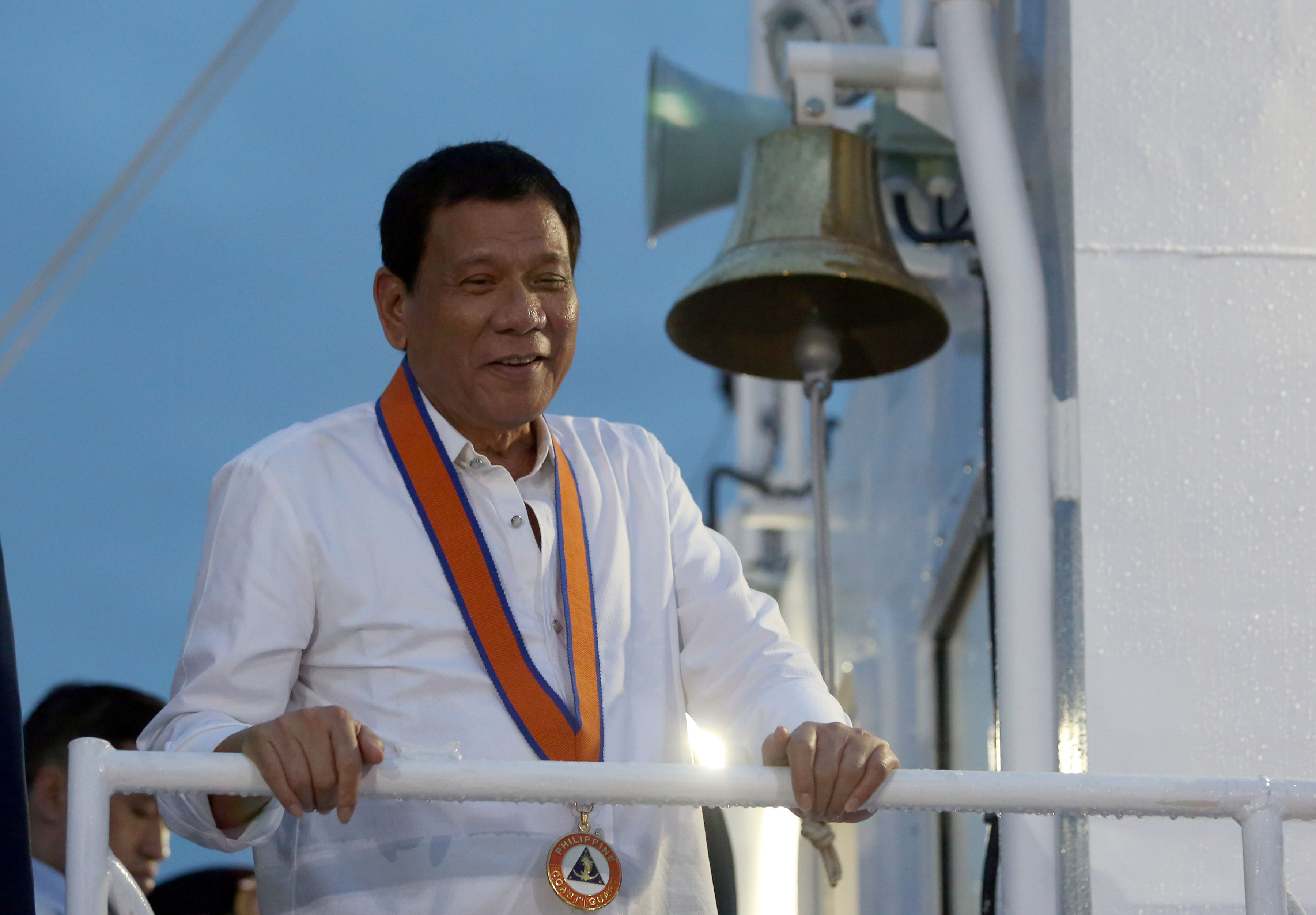 OFF TO CHINA. President Rodrigo Duterte beams as he leads the inspection of Barko ng Republika ng Pilipinas (BRP) Tubbataha during the 115th anniversary of the Philippine Coast Guard on October 12, 2016. File photo by Rey Baniquet/Presidential Photo  