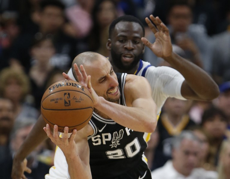 RESILIENT. Manu Ginobili and the San Antonio Spurs make sure that Draymond Green and the Golden State Warriors won’t take the ball – and the series – from them that easily. Photo by Ronald Cortes/Getty Images/AFP 