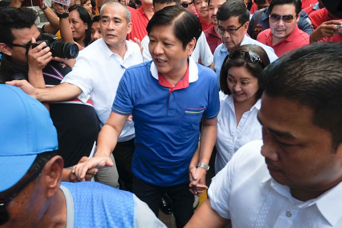 THE STRONGMAN'S JUNIOR. Senator Bongbong Marcos makes his way through the crowd as he is set to file his COC for Vice President on October 13, 2015. Photo by George Moya/Rappler   