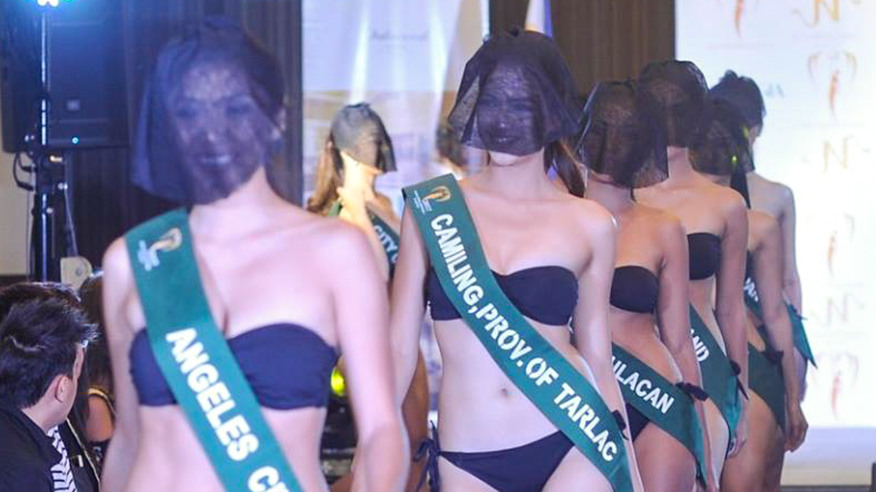 BLACK VEILS. The ladies at the Miss Philippines Earth swimsuit preliminaries wear black veils over their faces. Photo by ALX Studio Photography via screengrab from Facebook/OakwoodManila  