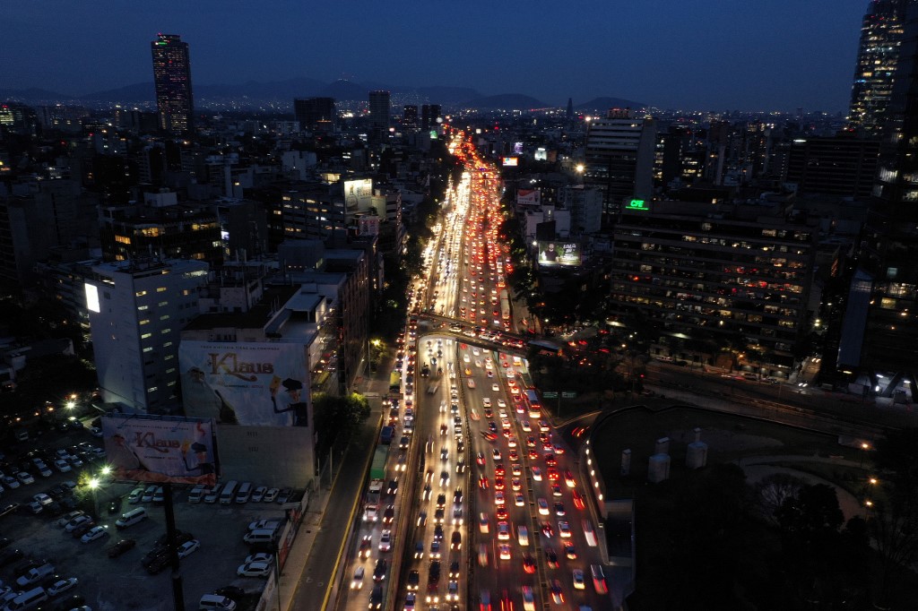 GRIDLOCK. Aerial view of peak hours in Mexico City on November 20, 2019. Photo by Pedro Pardo/AFP  