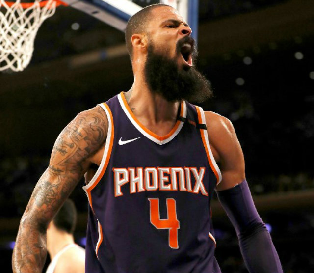 THROW IT DOWN. Tyson Chandler wins the game for Phoenix with as dominant a play as could be drawn up. File photo by Elsa/Getty Images/AFP  