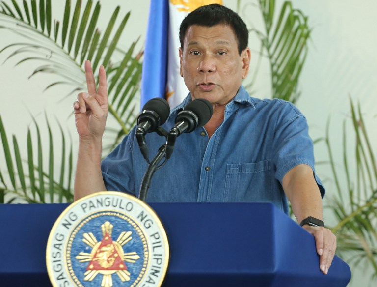 DUTERTE. This file photo taken on October 16, 2016 shows Philippine President Rodrigo Duterte as he delivers his speech prior to departing for a visit to Brunei and China at Davao airport. File photo by Manman Dejeto/AFP 