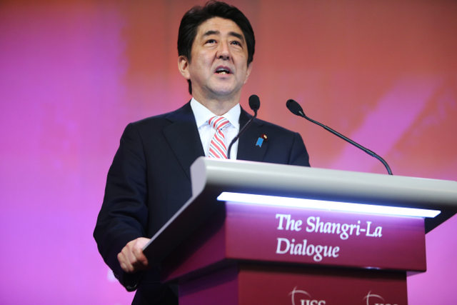 SHINZO ABE. Japanese Prime Minister Shinzo Abe gives the keynote address at The International Institute for Strategic Studies (IISS) 13th Asia Security Summit in Singapore, May 30, 2014. How Hwee Young/EPA