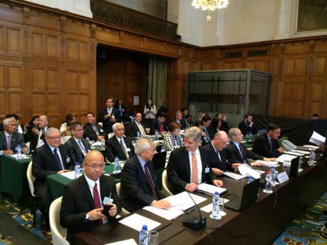 DAY TWO. The Philippine delegation waits inside a session hall at The Hague, The Netherlands, for the second day of the oral hearings on the Philippines' case against China over the South China Sea. Photo courtesy of Abigail Valte 