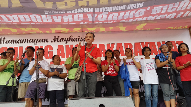 STILL FIGHTING. BAYAN Secretary-General addresses the rallyists in Mendiola. Photo by Pocholo Espina/ Rappler 