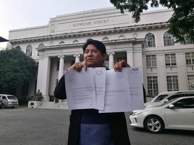 THE MAN BEHIND THE IMPEACHMENT COMPLAINT. In this file photo, lawyer Larry Gadon sends his request letters to the Supreme Court for documents. File photo from Larry Gadon 