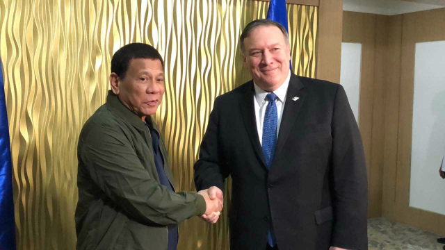OFFICIAL HANDSHAKE. President Rodrigo Duterte meets with US Secretary of State Mike Pompeo at Villamor Air Base in the evening of February 28, 2019. Malacañang Press Corps pool photo   