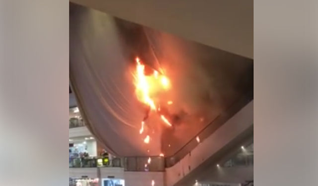 FIRE IN GLORIETTA. Fire strikes a cloth or canvas within the Glorietta mall on Monday, April 10. Screen shot from video by Gelo Castelo on Facebook. 