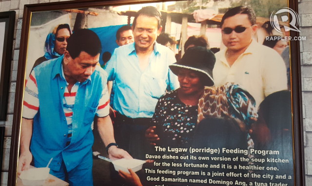 ALL THESE YEARS. This old photograph displayed in a Davao City restaurant shows a younger Bong Go (right-most, in shades). Photo by Pia Ranada/Rappler   