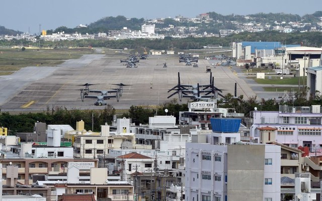 BASE IN DANGER? This photo taken on November 14, 2014, shows multi-mission tiltrotor Osprey aircraft at the US Marine's Camp Futenma in a crowded urban area of Ginowan, Okinawa prefecture. File photo by Toru Yamanaka/AFP 