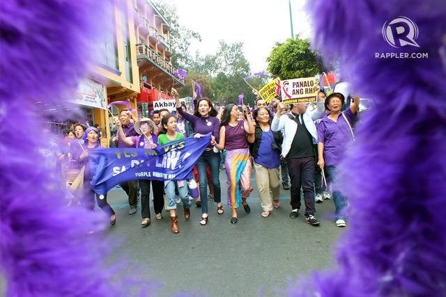 'HISTORIC'. Supporters of the Reproductive Health law holds a triumphant parade after the Supreme Court announcement Tuesday, April 8. Photo by Rappler
