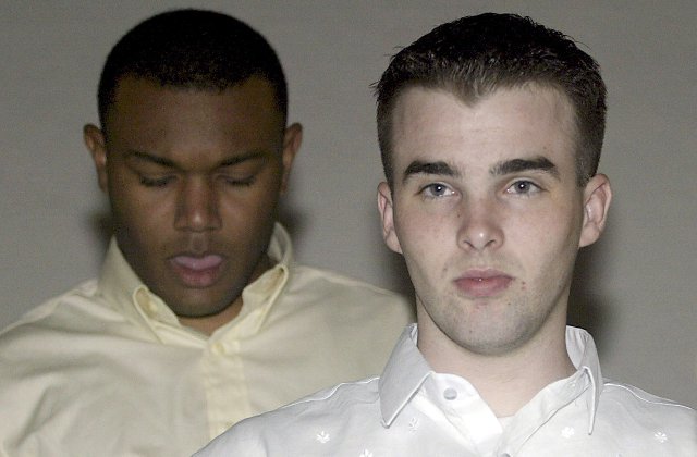 HEARING. US Marines Staff Sergeant Dominic Duplantis (L) and Lance Corporal Daniel Smith leave the courtroom after their hearing on the Subic rape case in 2006. Photo by Mike Alquinto/EPA 
