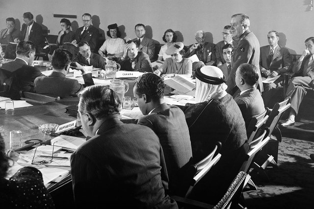 CHARTER. In 1945, delegates meet in San Francisco to negotiate a charter for the organization that was to become the United Nations. Standing is Lieutenant Colonel Henri Rolin of Belgium. UN Photo 