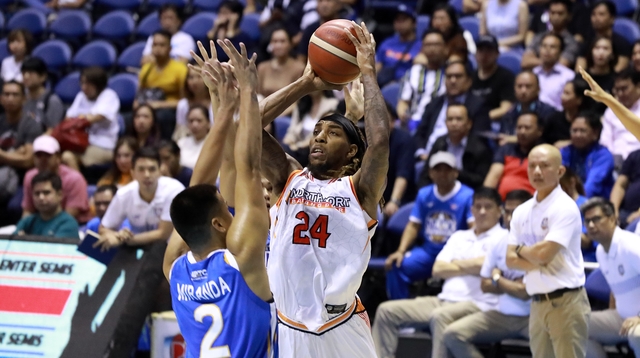 ON TO THE NEXT. Michael Qualls propels NorthPort to its second semifinals appearance in franchise history. Photo from PBA Images   