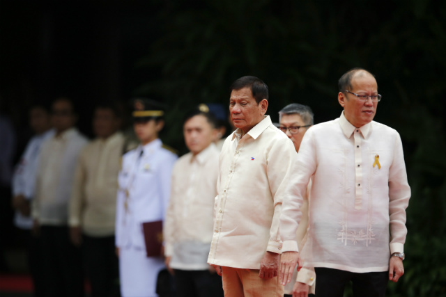TURNING OVER. During his inaugural speech, President Rodrigo Duterte (left) vows to honor the Philippines' international obligations, including those signed under previous presidents such as Benigno Aquino III (right). Photo by Francis Malasig/EPA  