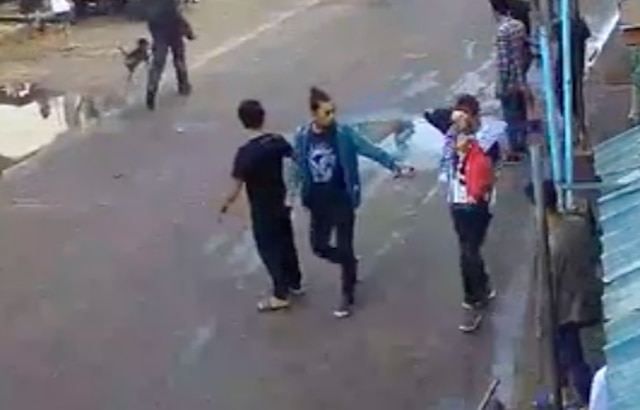 WRONG PERSON? The military says the man wearing a bun and a blue-green jacket is actually a Grade 11 student. Screenshot from AFP Westmincom video 