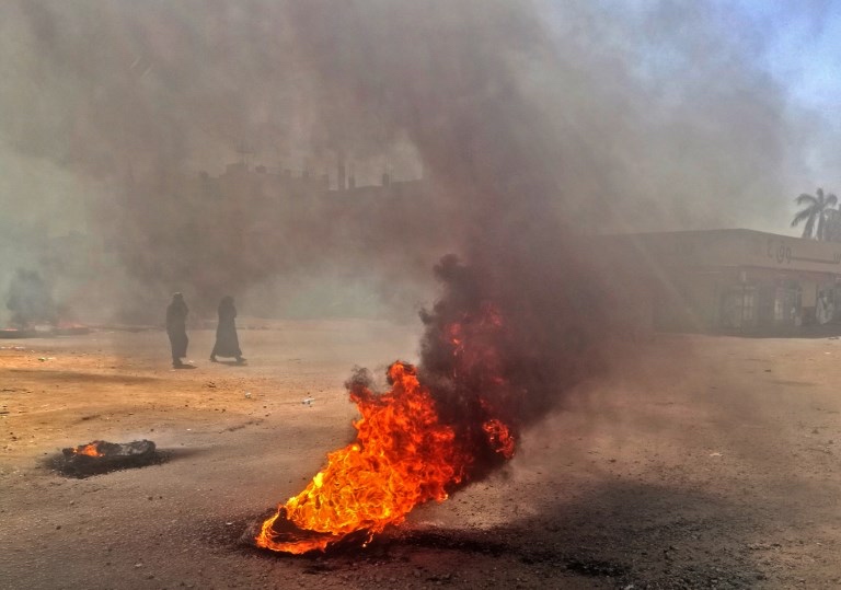 UNREST. Sudanese protestors burn tires during an anti-government demonstration on January 18, 2019 in the capital Khartoum. Photo from AFP 