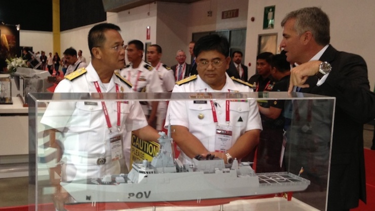 SHIPS, TOO: Navy officers checking out ship models