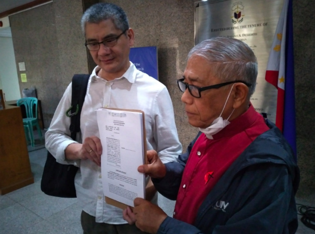 ACCOUNTABLE. Ibon executive director Sonny Africa and Board of Trustees chairperson Bishop Solito Toquero file a complaint against officials over red-tagging. Photo from Ibon Foundation 