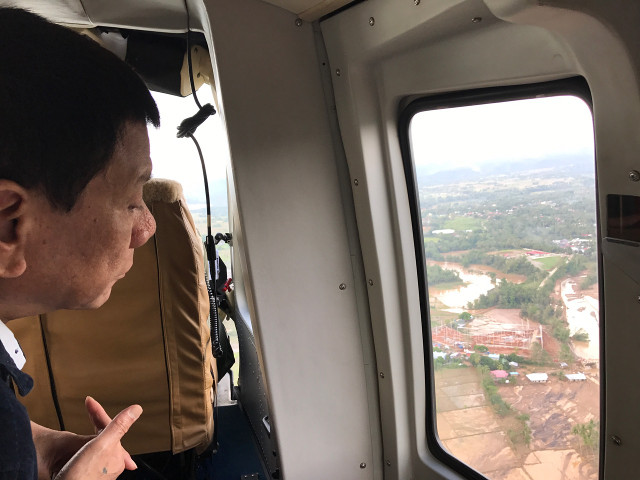 URDUJA DAMAGE. President Rodrigo Duterte surveys areas affected by Tropical Depression Urduja while aboard a chopper on his way to Biliran province. Photo from SAP Bong Go 
