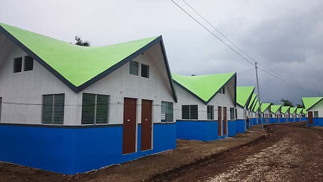 Houses in Daanbantayan featuring hyperbolic paraboloid roofs 
