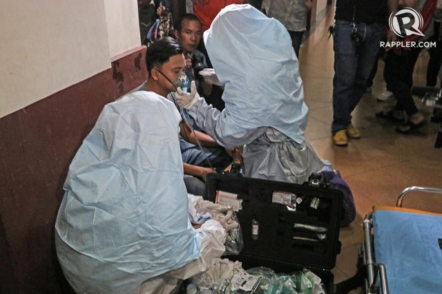 SIMULATION. Emergency responders in Cebu practice responding to a possible novelÂ coronavirusÂ outbreak. Photo by Gelo Litonjua/Rappler 