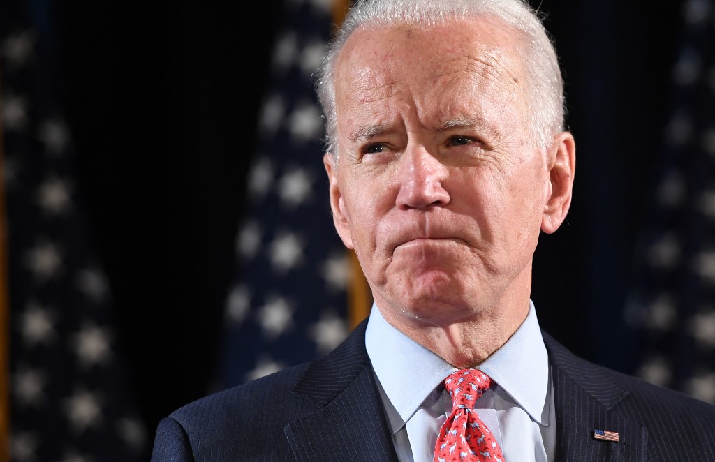 Drowned out by pandemic, a muted victory for Joe Biden