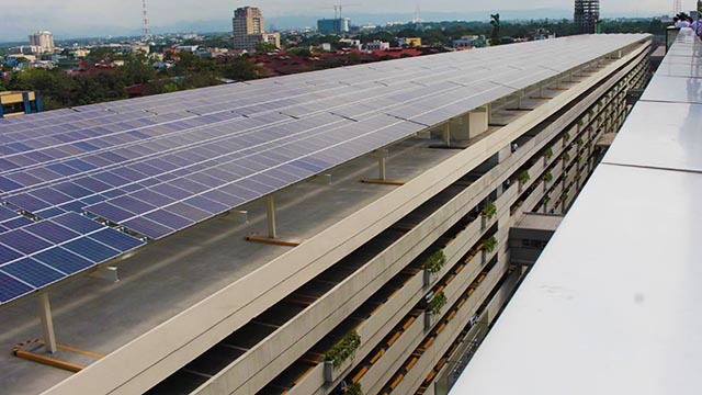 CLEAN ENERGY. There are 5,760 solar panels atop SM City North EDSA's parking building. Rappler file photo  