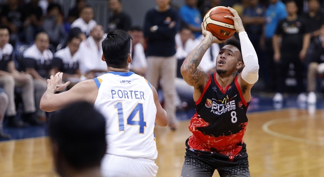 UNSCATHED. Calvin Abueva delivers a double-double and the game-winning block for Phoenix. Photo from PBA Images   