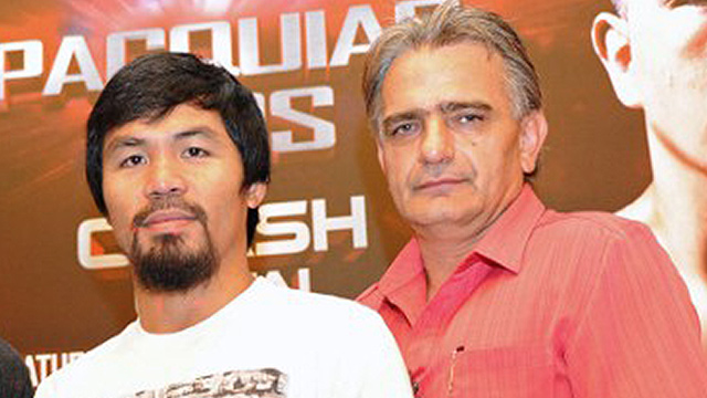 Manny Pacquiao and Michael Koncz pose for photos before Pacquiao's 2013 fight with Brandon Rios. Photo by Mohd Fyrol/AFP 