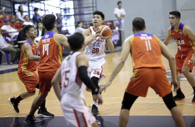 NEW ACQUISITION. Michael Mabulac (center) makes immediate impact as he puts up a double-double in his first game with the EAC Generals. Photo by PBA Images  