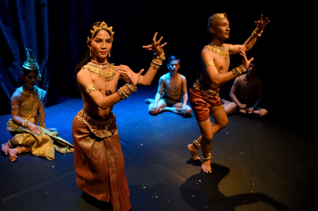 KHMER CULTURE. This photo taken on August 31, 2019 shows choreographer Prumsodun Ok (right) with members from the Prumsodun Ok & Natyarasa dance company during an Apsara dance performance in Phnom Penh.  Photo by Tang Chihin Sothy/AFP  