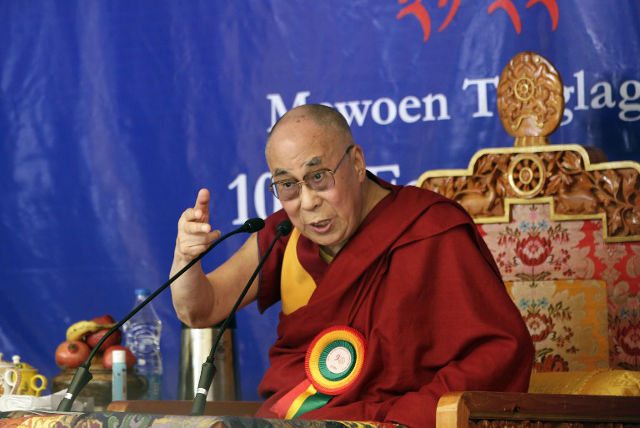 DALAI LAMA GETS AN APP. His Holiness the Dalai Lama gestures at a function in Dharamsala on October 10, 2015. File Photo by AFP. 